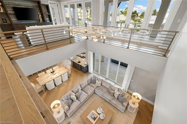 a view of living room with furniture and flat screen tv