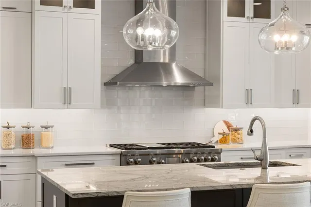 a kitchen with a stove and cabinets
