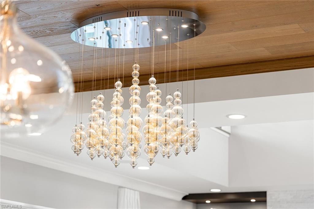 175 Conners Avenue Naples, FL 34108 - Photo 10 of 49 a bathroom with a sink and a mirror