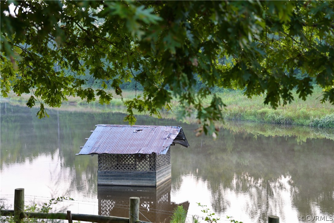 Lot 2 Parsons Road Beaverdam, VA 23015 - Photo 11 of 14 a front view of a house with a lake view