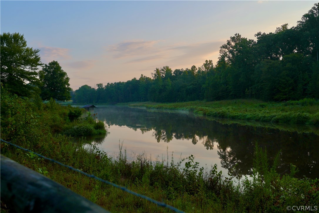 Lot 2 Parsons Road Beaverdam, VA 23015 - Photo 7 of 14 a lake view with a garden