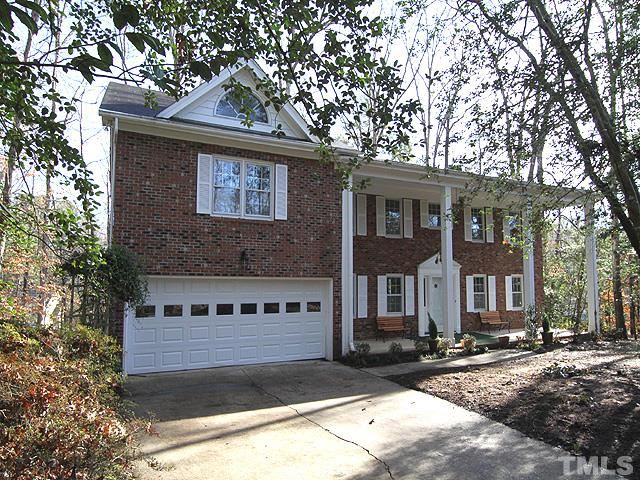 4500 Connell Drive Raleigh, NC 27612 - Photo 1 of 25 a view of a brick house with a large windows