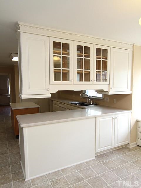 4500 Connell Drive Raleigh, NC 27612 - Photo 11 of 25 a view of a kitchen counter top space and windows