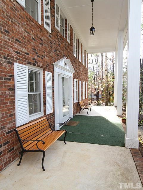 4500 Connell Drive Raleigh, NC 27612 - Photo 5 of 25 a backyard of a house with barbeque oven table and chairs
