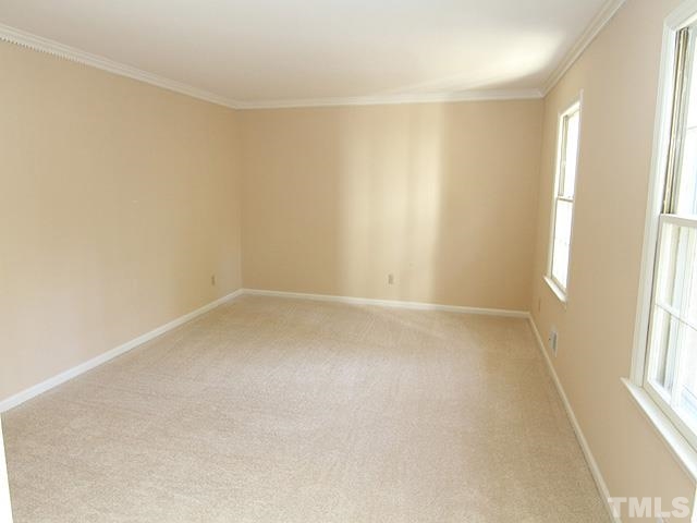 4500 Connell Drive Raleigh, NC 27612 - Photo 7 of 25 an empty room with a window