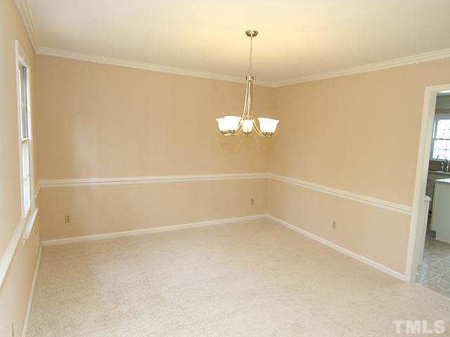 4500 Connell Drive Raleigh, NC 27612 - Photo 8 of 25 a view of an empty room with a window