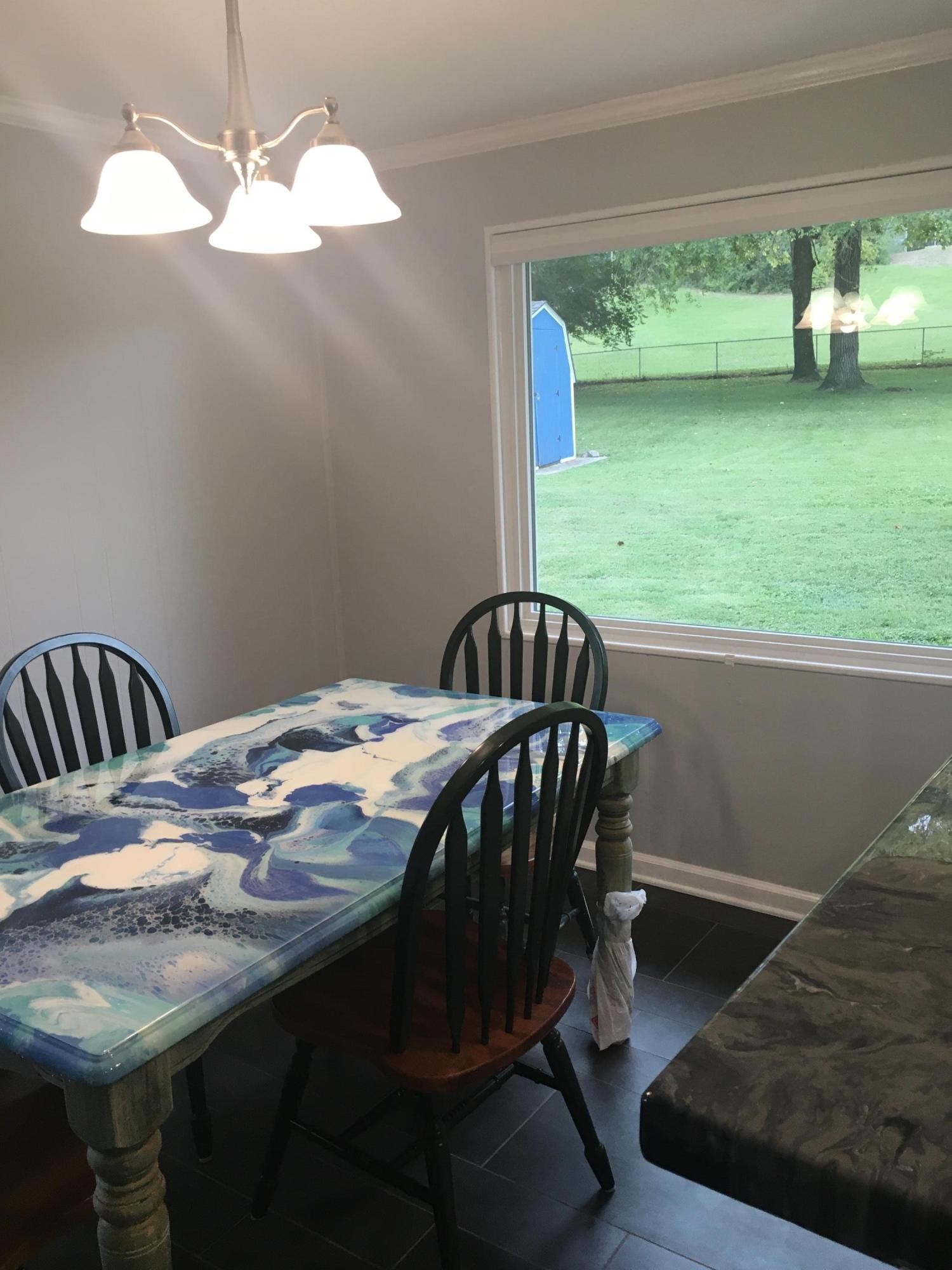 151 Beverly Circle Oak Ridge, TN 37830 - Photo 9 of 20 a view of a dining room with furniture window and outside view