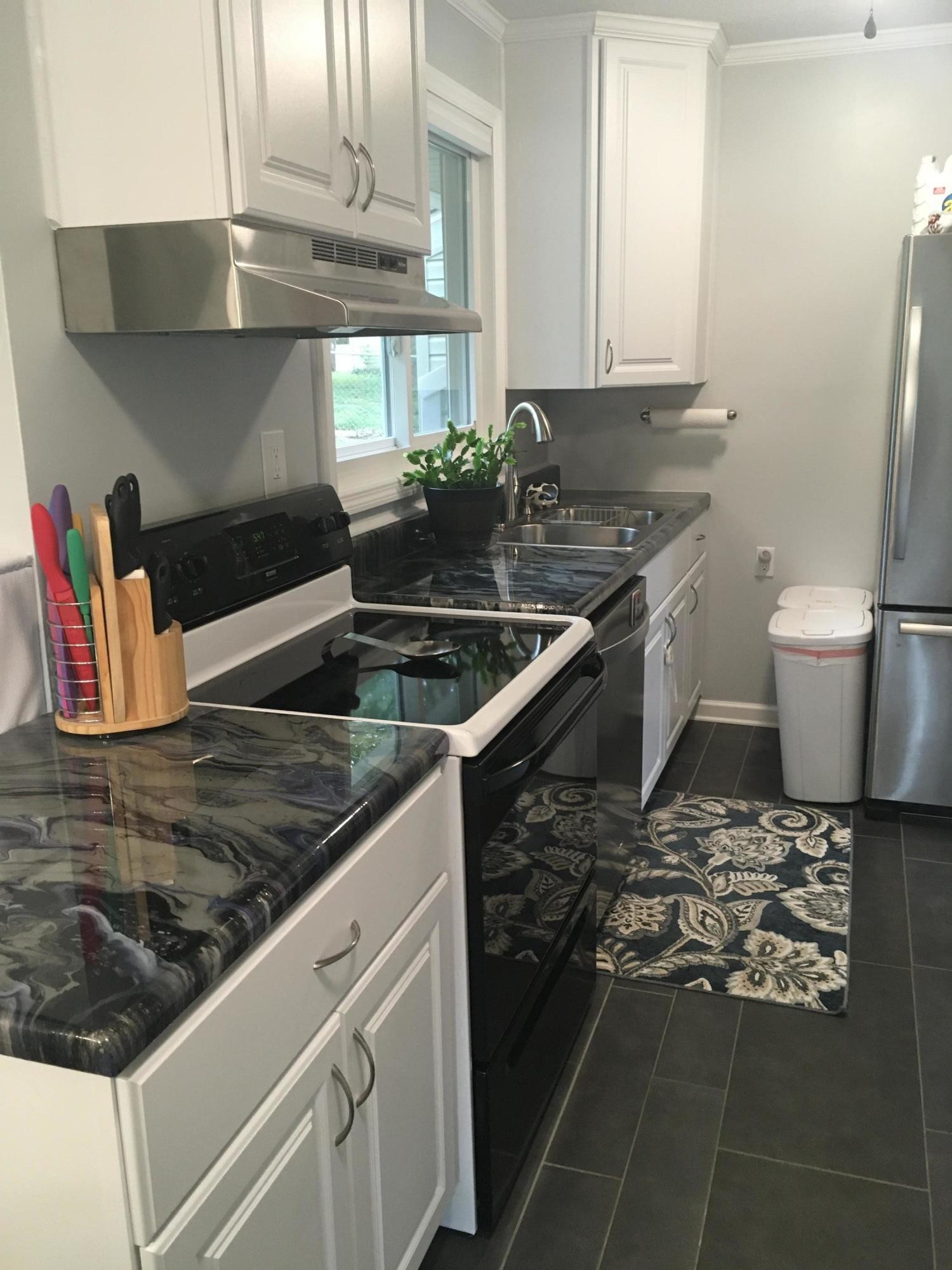 151 Beverly Circle Oak Ridge, TN 37830 - Photo 10 of 20 a kitchen with a stove and a sink