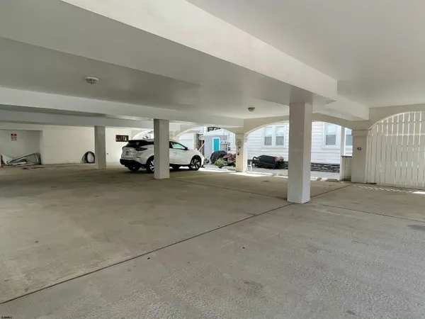 a view of a livingroom with car parked