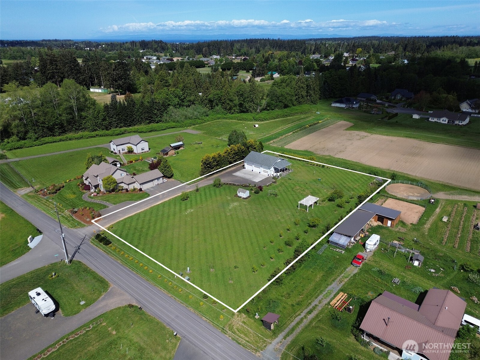 152 Macleay Road Sequim, WA 98382 - Photo 3 of 40 an aerial view of a football ground