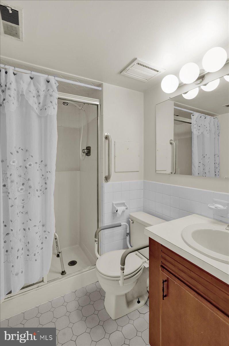 7 Fairway Road Reading, PA 19607 - Photo 12 of 20 a bathroom with a sink a toilet and shower