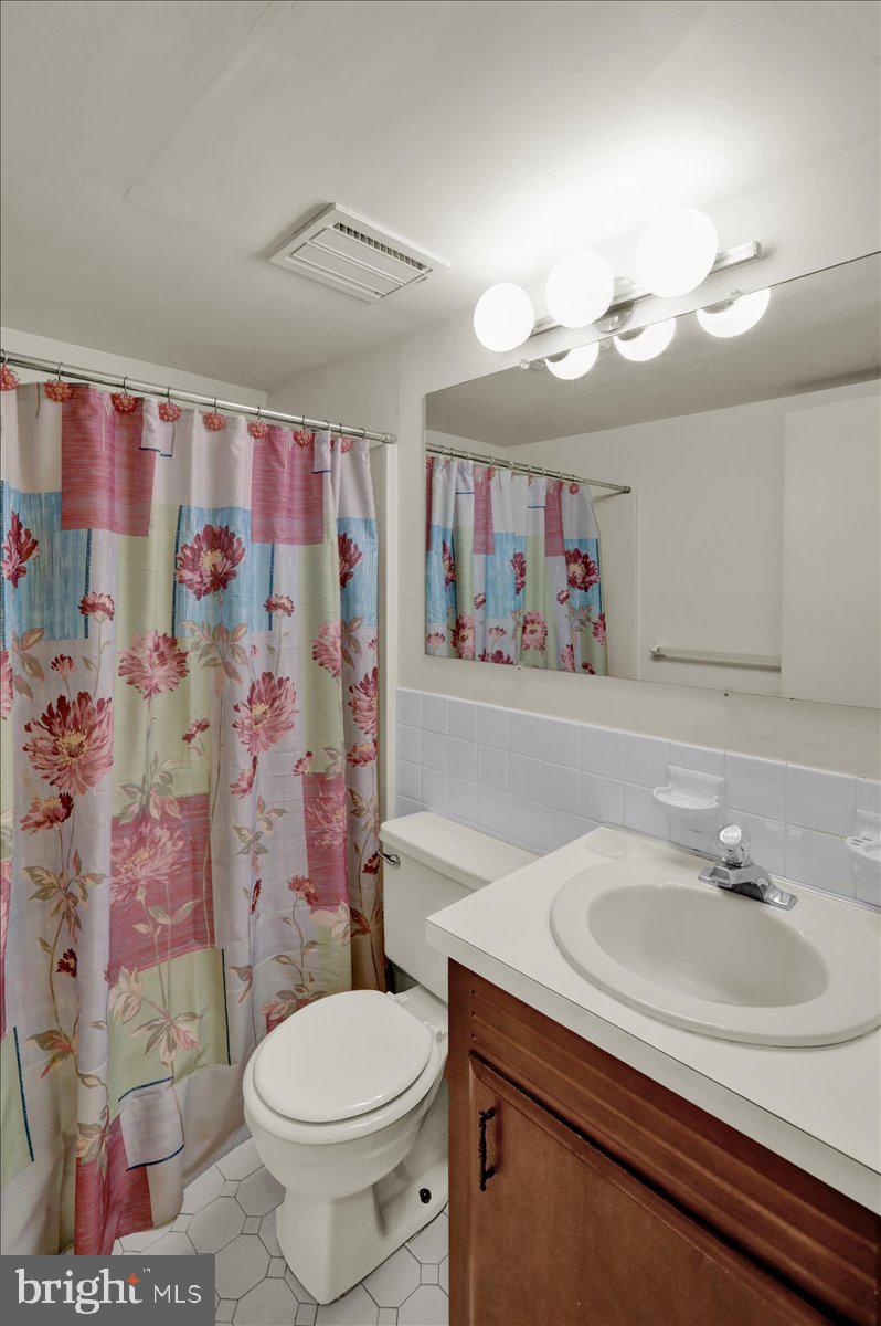 7 Fairway Road Reading, PA 19607 - Photo 16 of 20 a bathroom with a sink vanity mirror and toilet