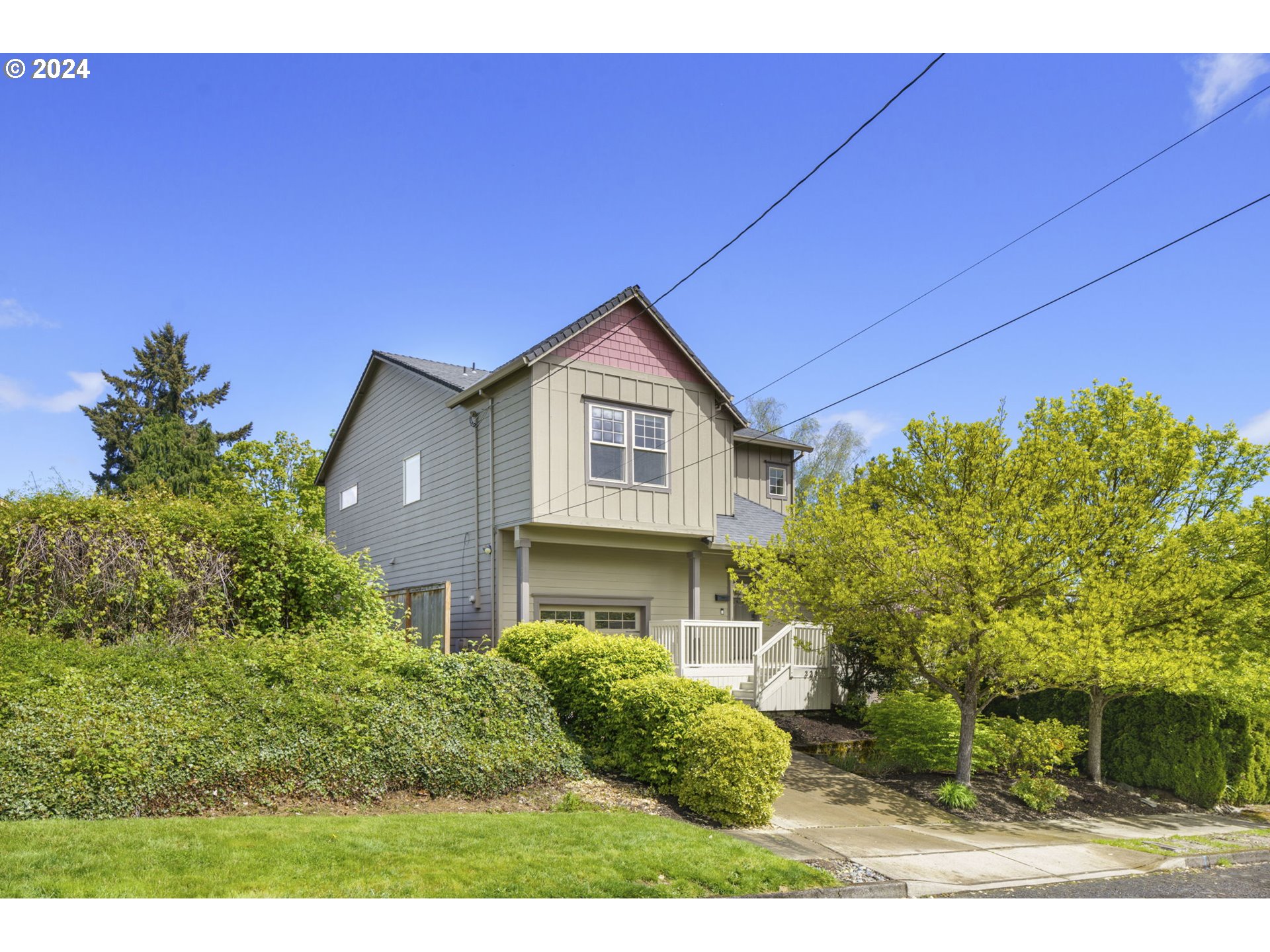 323 Southwest Carson Street Portland, OR 97219 - Photo 1 of 30 a view of a house with a yard