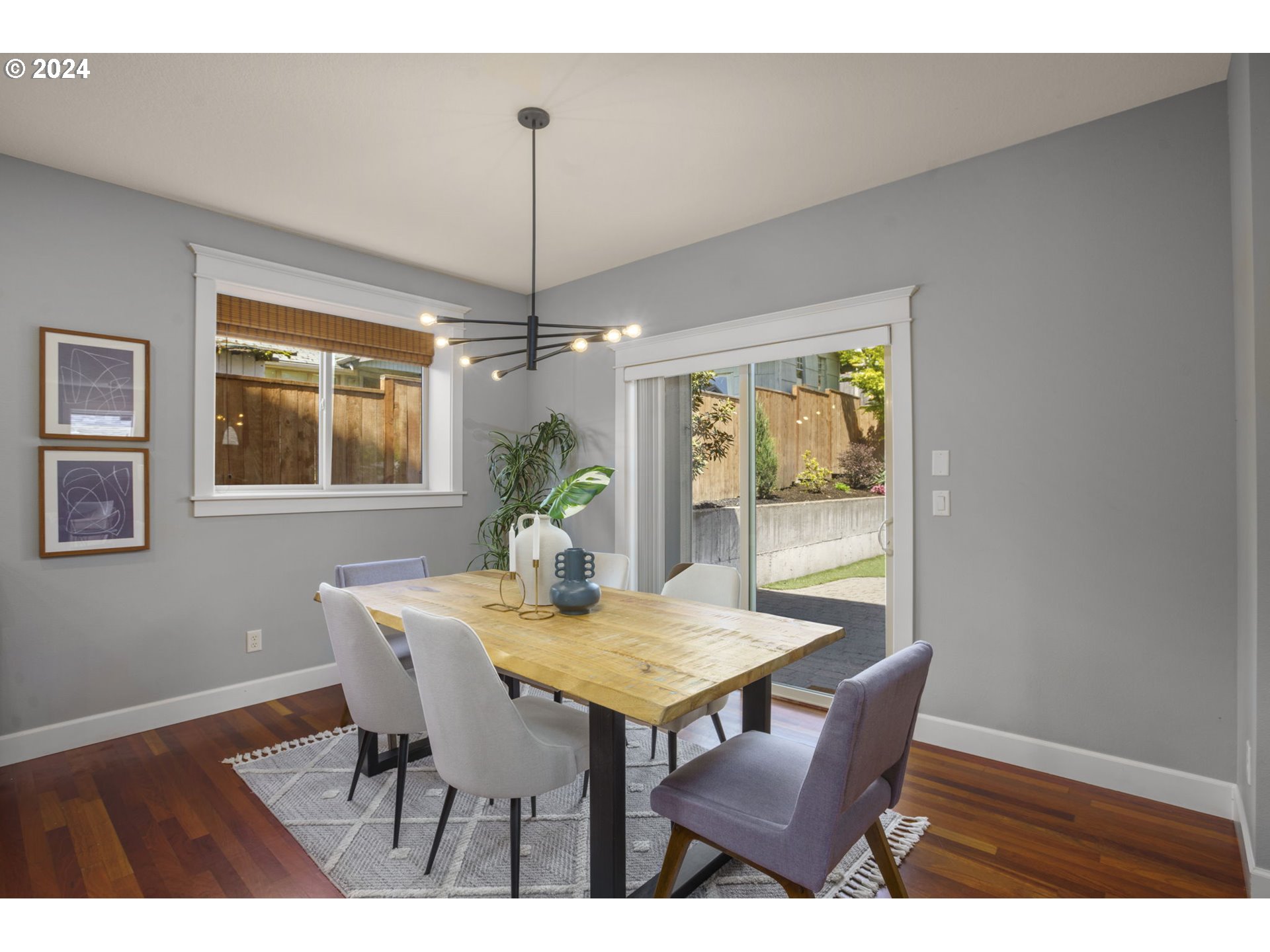 323 Southwest Carson Street Portland, OR 97219 - Photo 13 of 30 a view of a dining room with furniture window and wooden floor