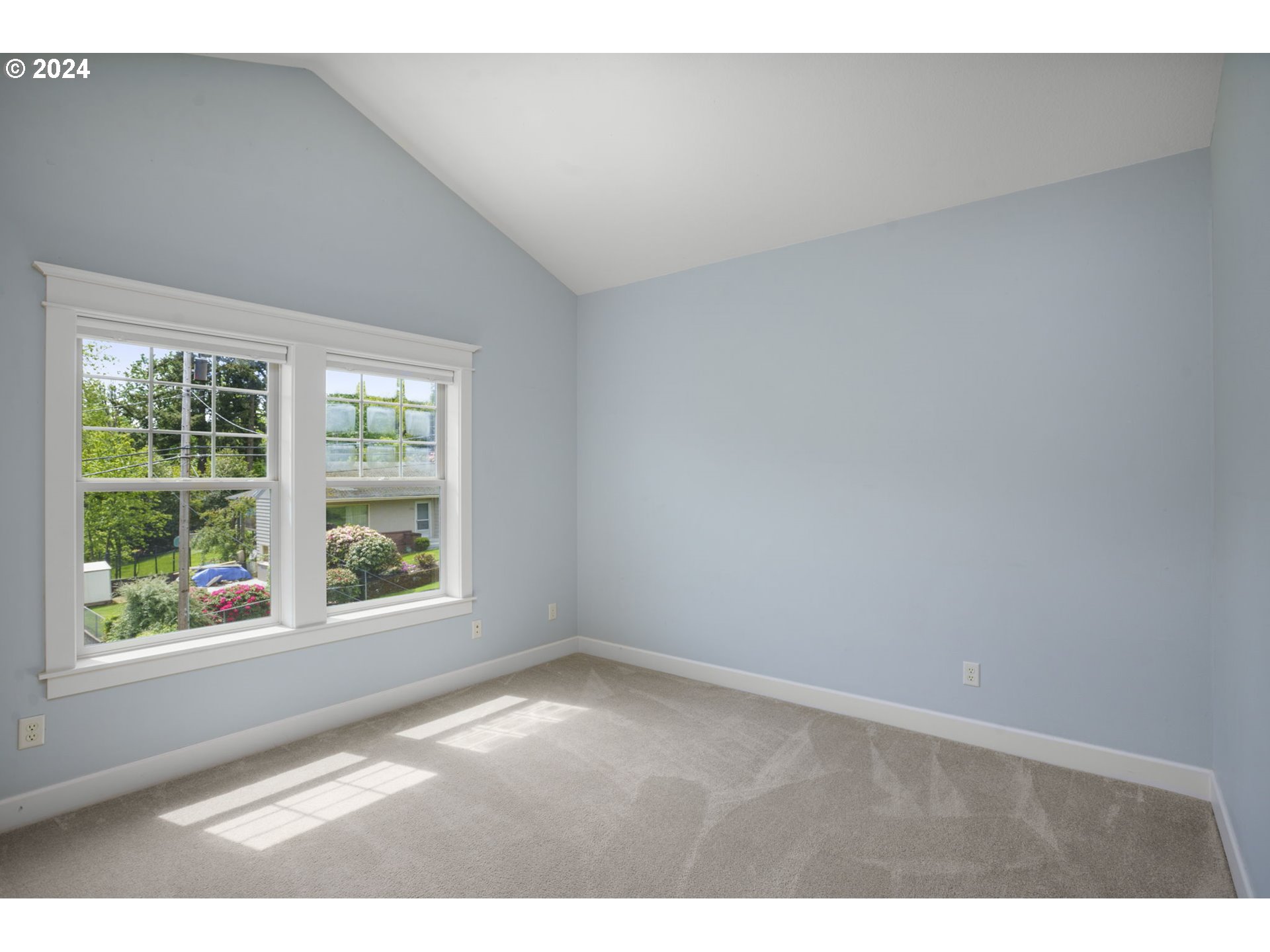 323 Southwest Carson Street Portland, OR 97219 - Photo 21 of 30 a view of an empty room with a window