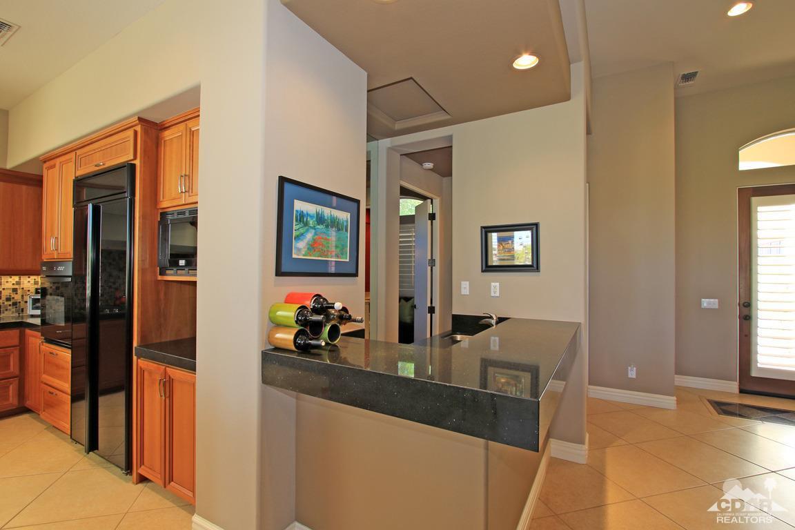 255 Loch Lomond Road Rancho Mirage, CA 92270 - Photo 18 of 32 a view of living room and kitchen