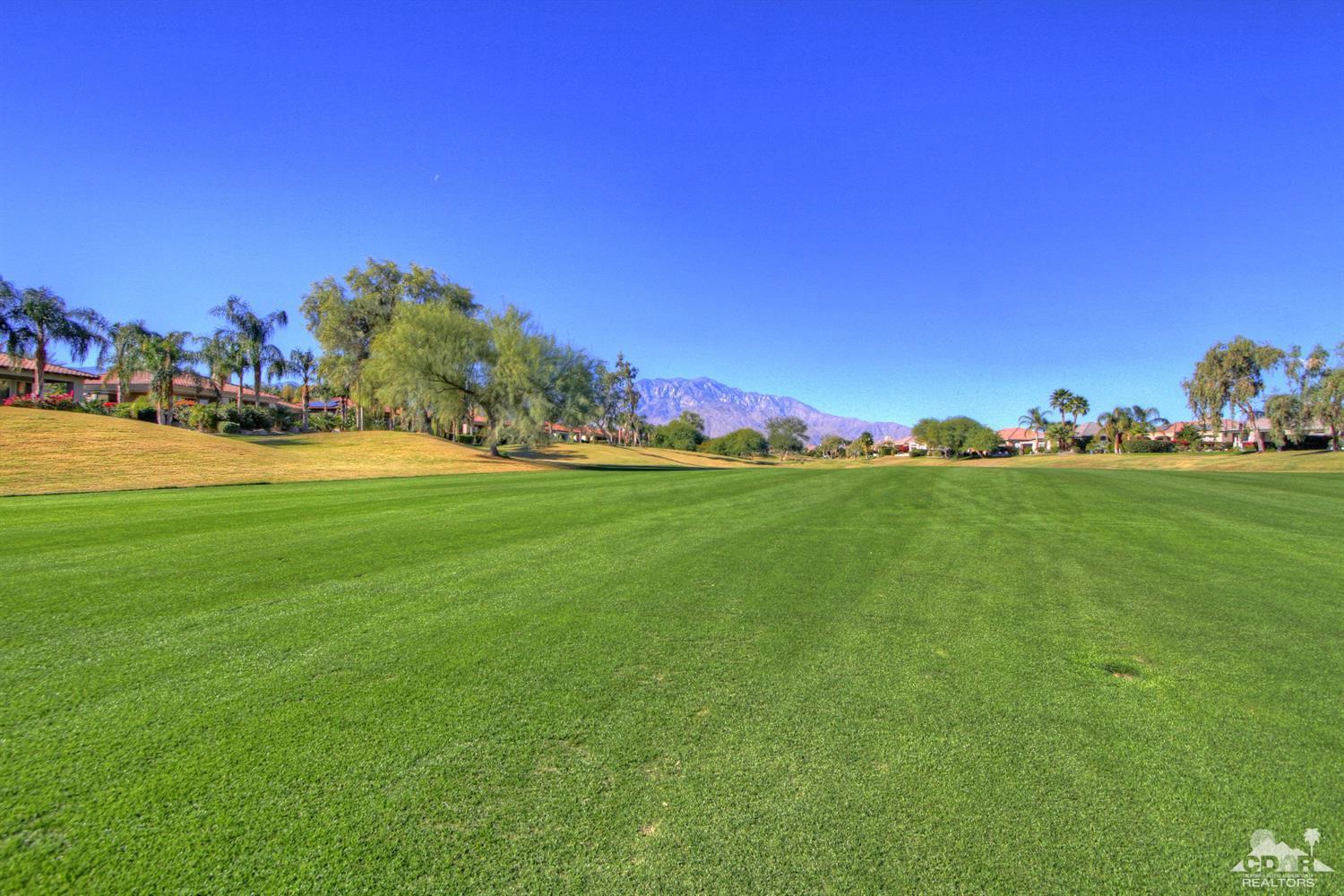 255 Loch Lomond Road Rancho Mirage, CA 92270 - Photo 29 of 32 a view of an ocean and trees