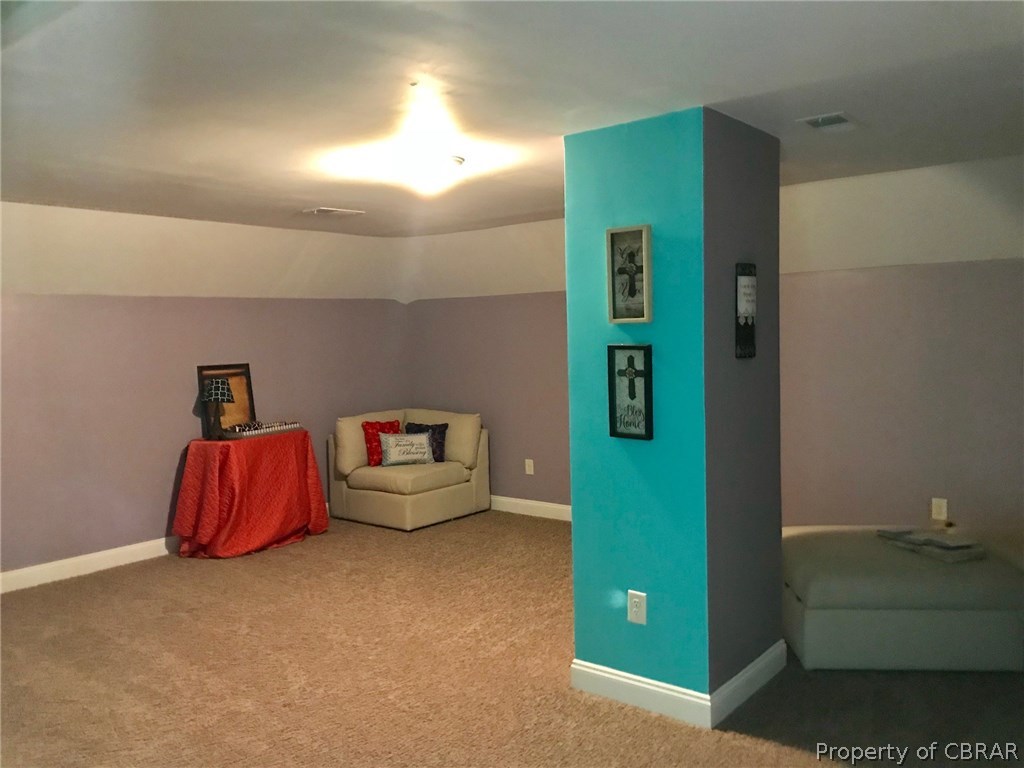 3939 Funny Farm Road Hayes, VA 23072 - Photo 15 of 17 This room would make great theater room for the family to enjoy together.