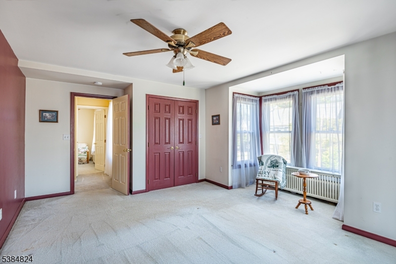 63 Main Street Bloomsbury, NJ 08804 - Photo 12 of 26 a living room with furniture and a window