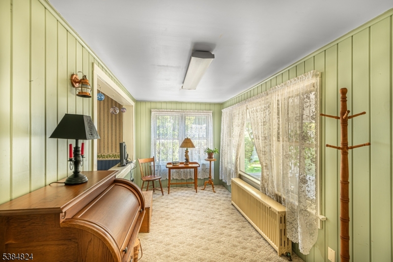 63 Main Street Bloomsbury, NJ 08804 - Photo 16 of 26 a bedroom with furniture and a large window