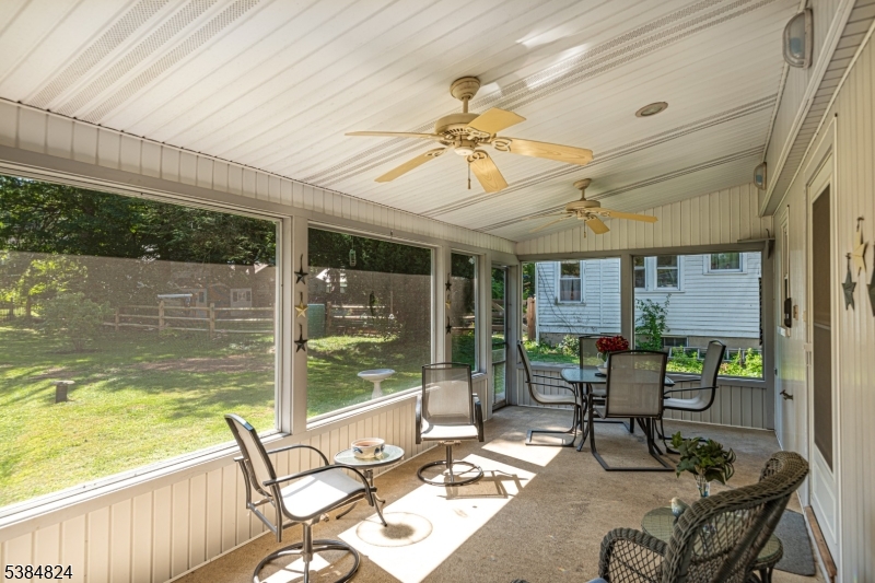 63 Main Street Bloomsbury, NJ 08804 - Photo 20 of 26 a building outdoor space with patio furniture and potted plants