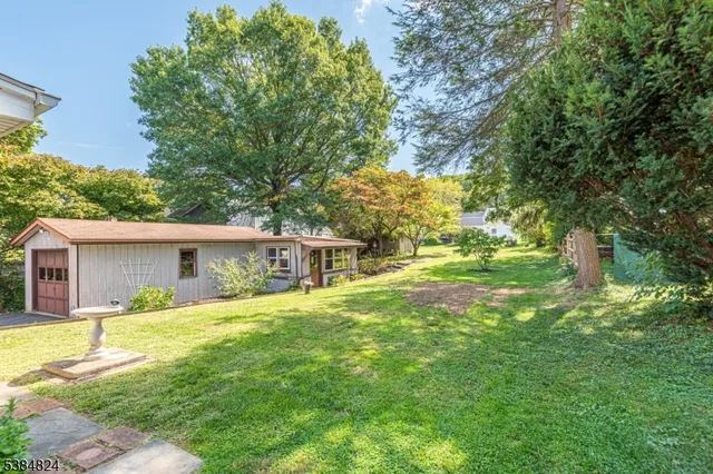 a house view with a garden space