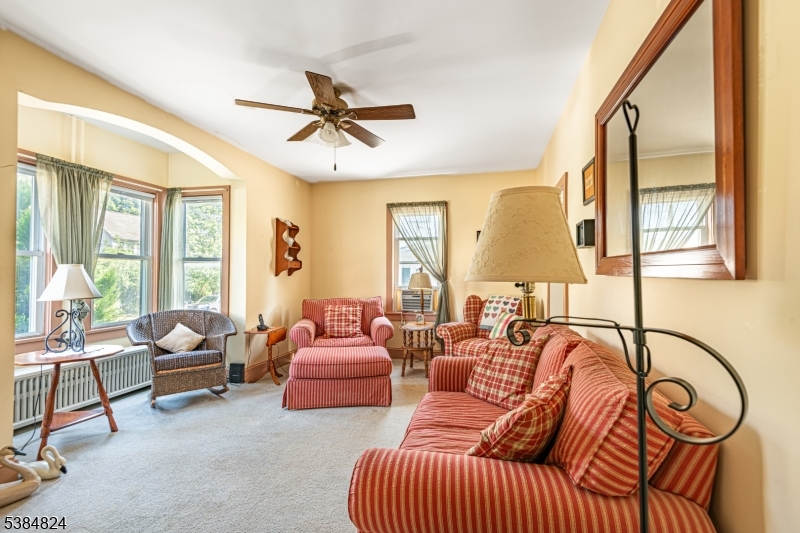63 Main Street Bloomsbury, NJ 08804 - Photo 3 of 26 a living room with furniture and a large window