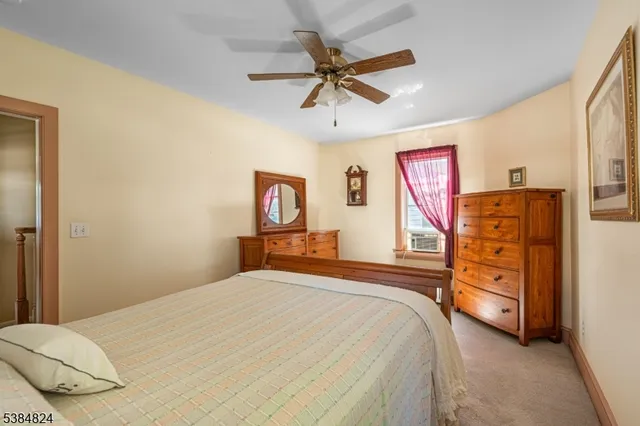 a bedroom with a bed and a closet