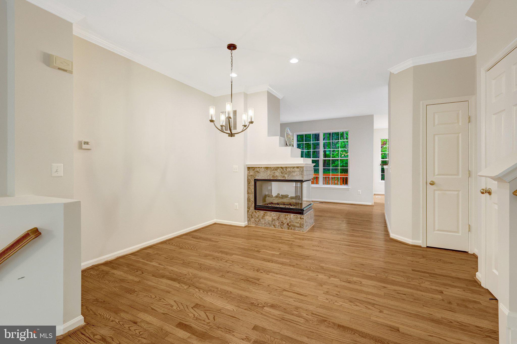 1268 Wild Hawthorn Way Reston, VA 20194 - Photo 10 of 55 New Chandelier accents Dining Room