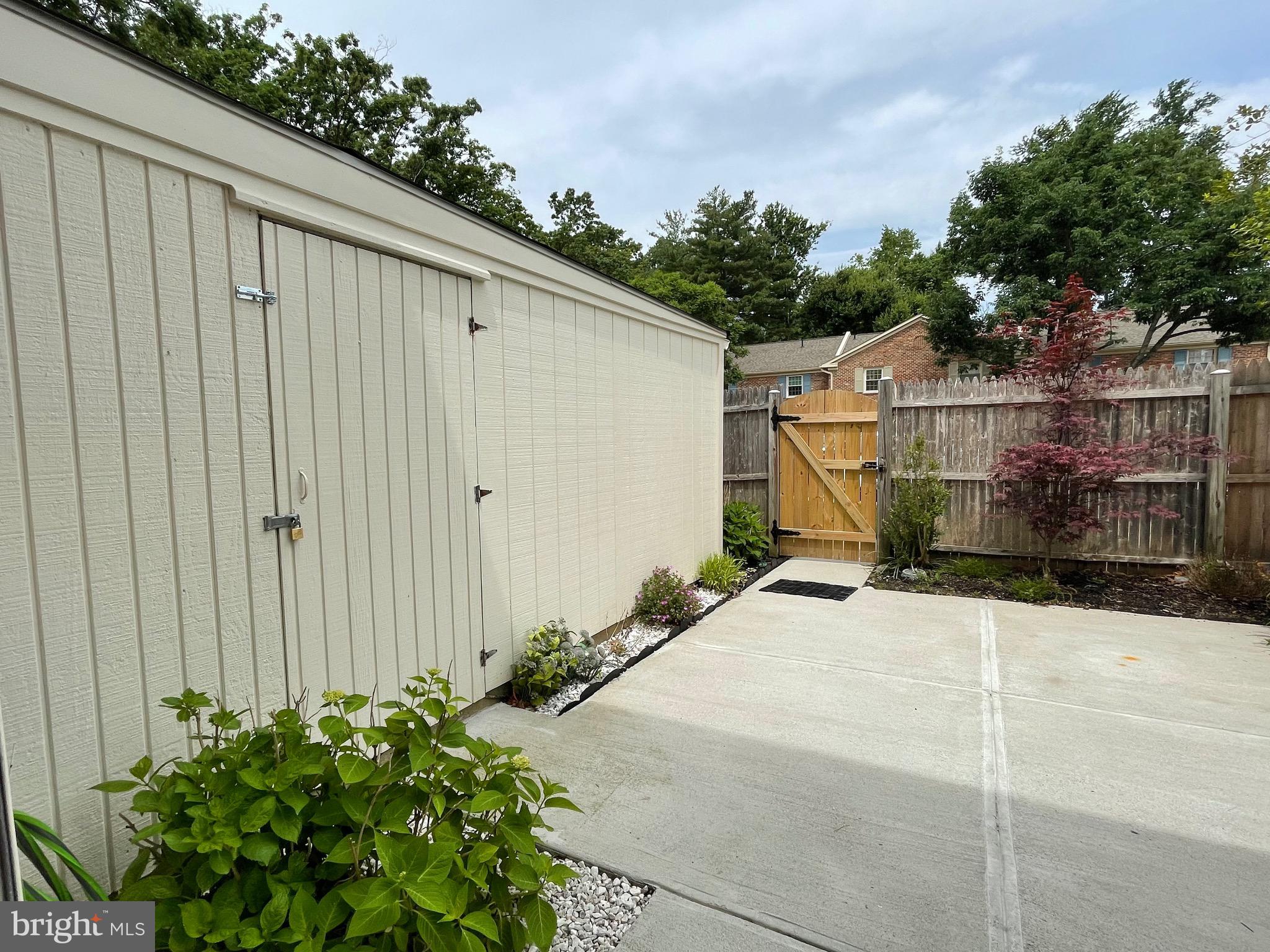 8546 Forrester Boulevard, Unit 880 Springfield, VA 22152 - Photo 3 of 12 Large Backyard with Shed