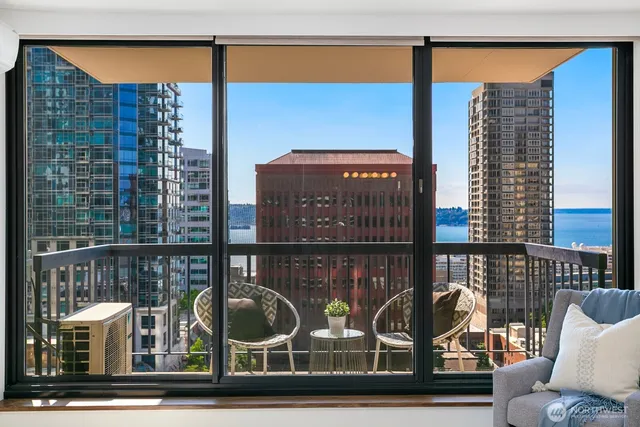 a view of balcony with furniture