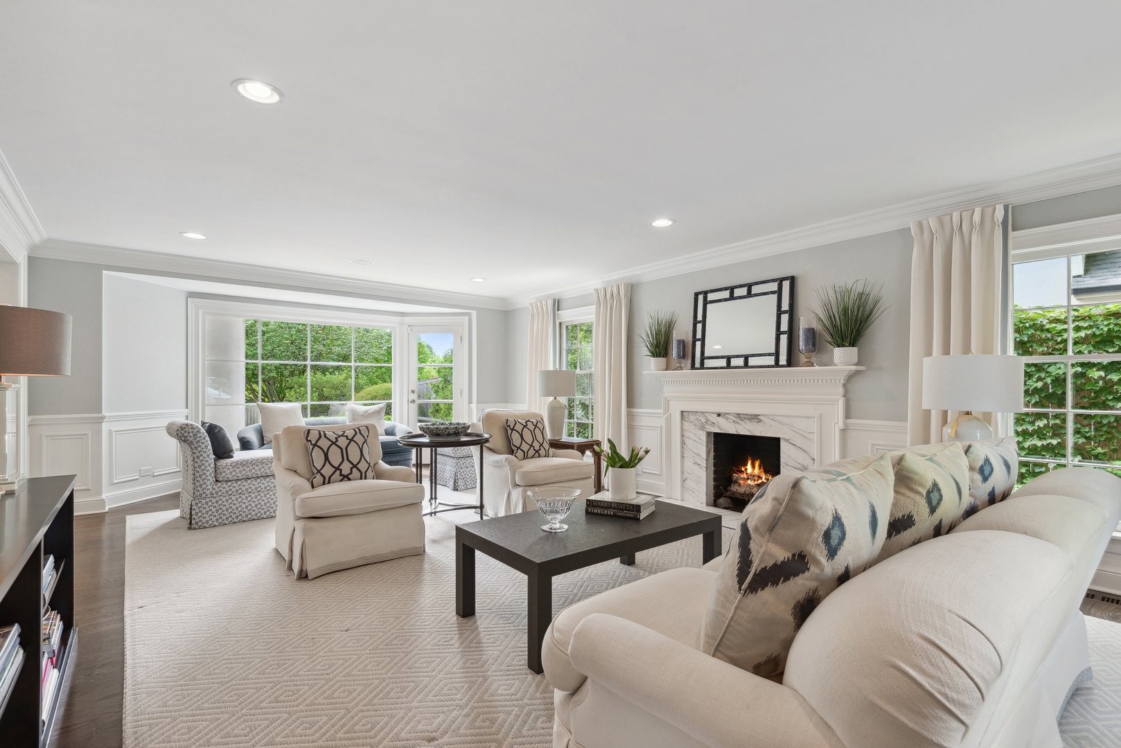 1335 Ridge Road Wilmette, IL 60091 - Photo 4 of 36 a living room with furniture fireplace and a large window