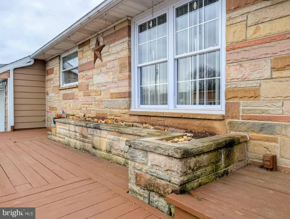 a room with a fireplace and a walk in closet