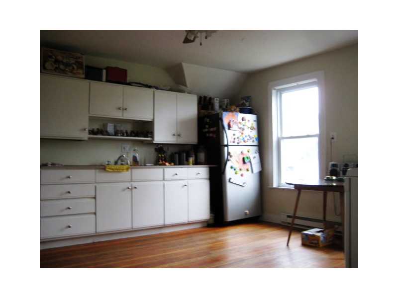 252 Grove Street Woonsocket, RI 02895 - Photo 13 of 14 Kitchen. 3rd Floor - Large EIK - Restored Hardwood Floors, Updated Cabinets, Counters, Appliances,