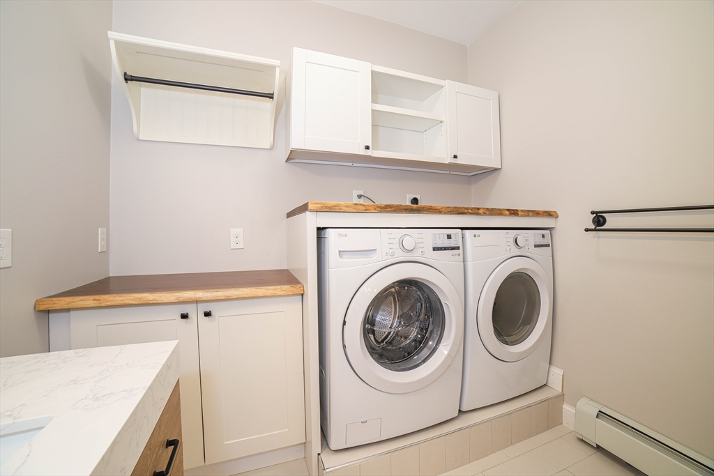 3 Woods Road Westminster, MA 01473 - Photo 17 of 42 a utility room with dryer and washer