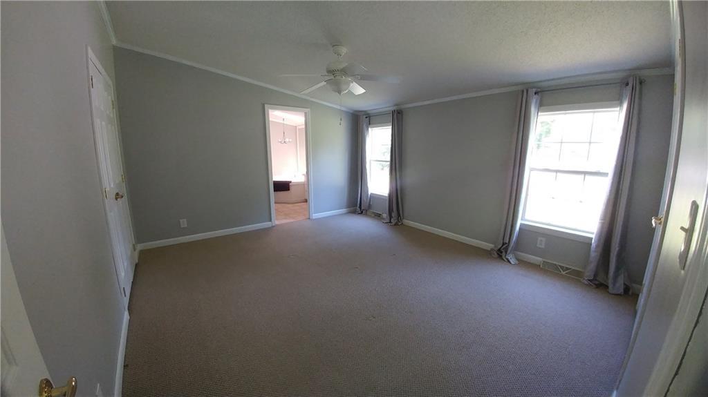 59 Wing Road Levant, ME 04456 - Photo 15 of 22 Master Bedroom and Bath w/ 2 large...