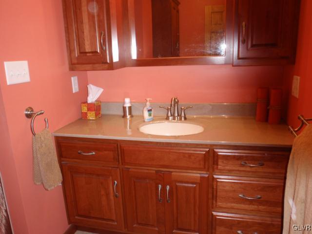 709 Brandywine Road Nazareth, PA 18064 - Photo 14 of 28 Updated Diefender bath with cherry cabinets, tile
