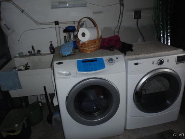 709 Brandywine Road Nazareth, PA 18064 - Photo 17 of 28 Laundry and laundry tub in the garage. Washer.dry