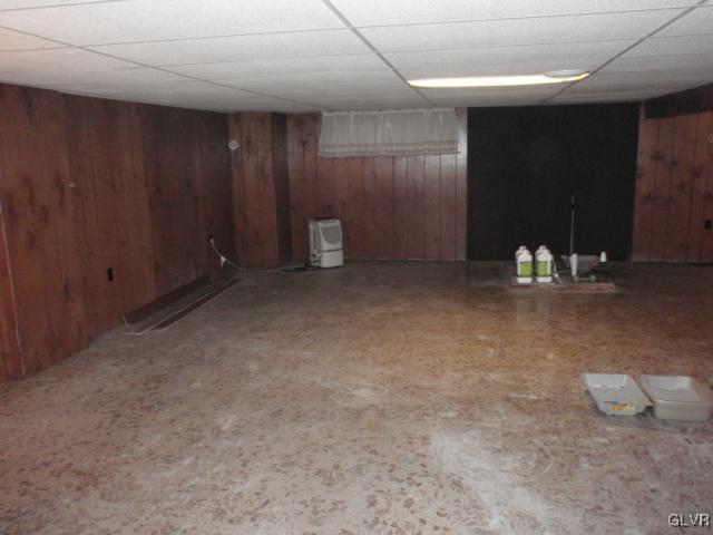 709 Brandywine Road Nazareth, PA 18064 - Photo 25 of 28 
L" shaped game room, there is a flue and base