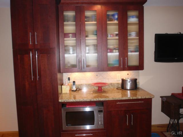 709 Brandywine Road Nazareth, PA 18064 - Photo 5 of 28 Lighted kitchen cabinets, SS microwaver stays, pan