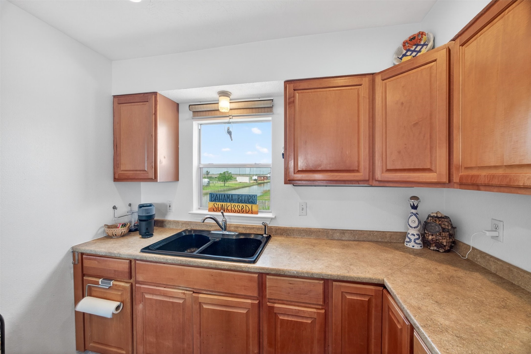 1209 North Jacks Road Crystal Beach, TX 77650 - Photo 12 of 39 Clean, coastal feel with natural light—low maintenance, high usability.