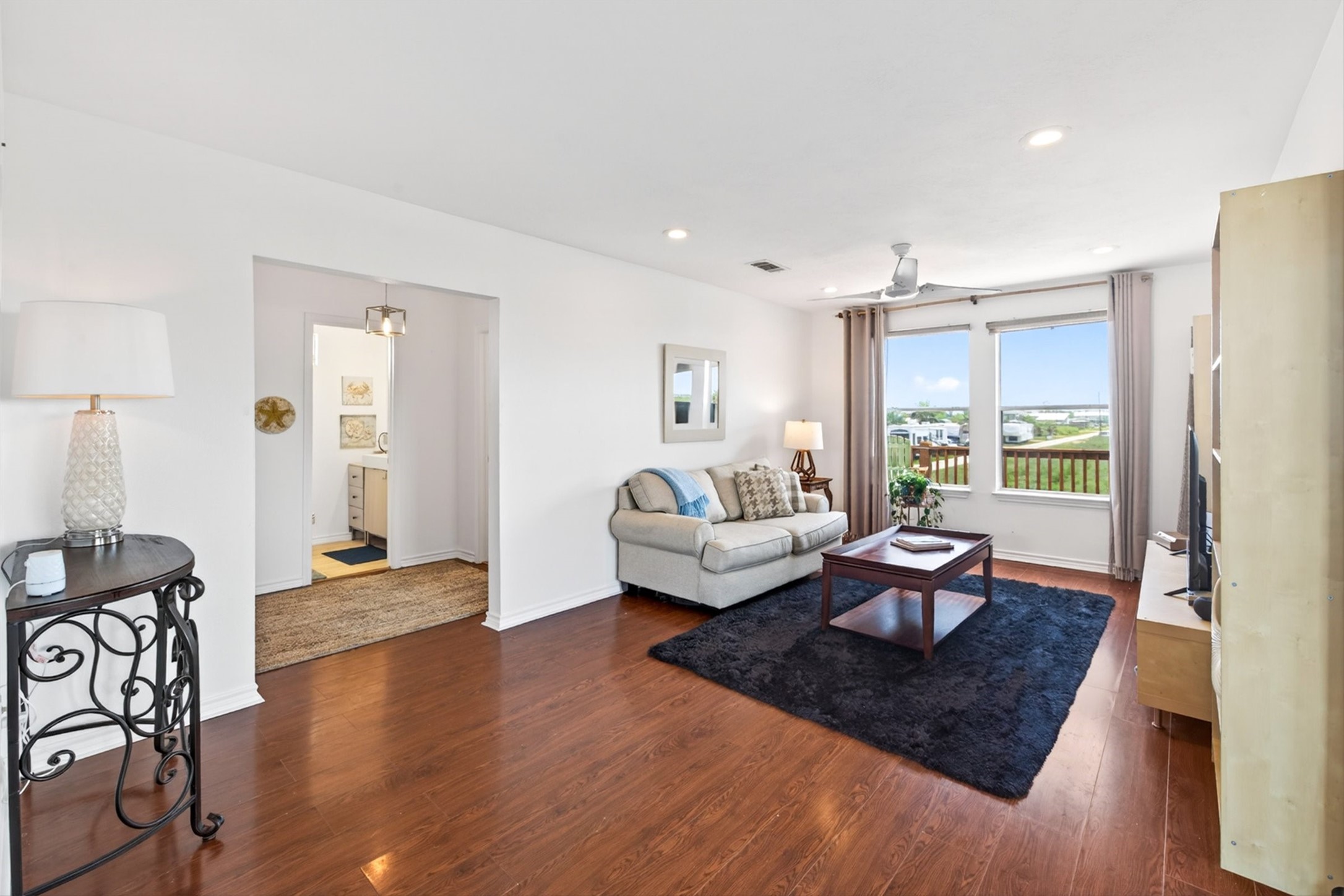 1209 North Jacks Road Crystal Beach, TX 77650 - Photo 16 of 39 Light-filled and welcoming with views that remind you why you’re here—coastal living made simple and comfortable.