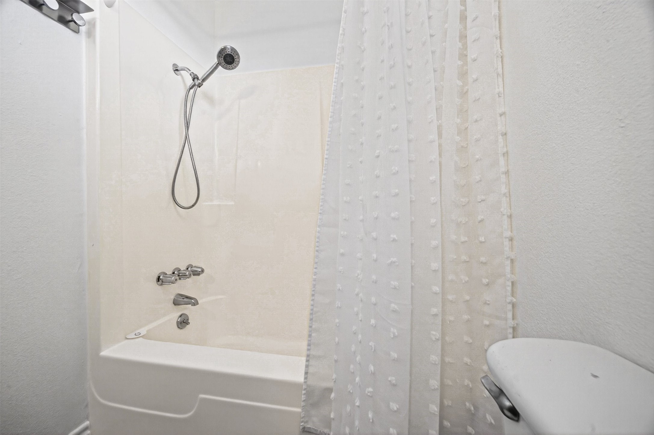 1209 North Jacks Road Crystal Beach, TX 77650 - Photo 21 of 39 Clean and low-maintenance—perfect for rinsing off after the beach or a day out on the boat.