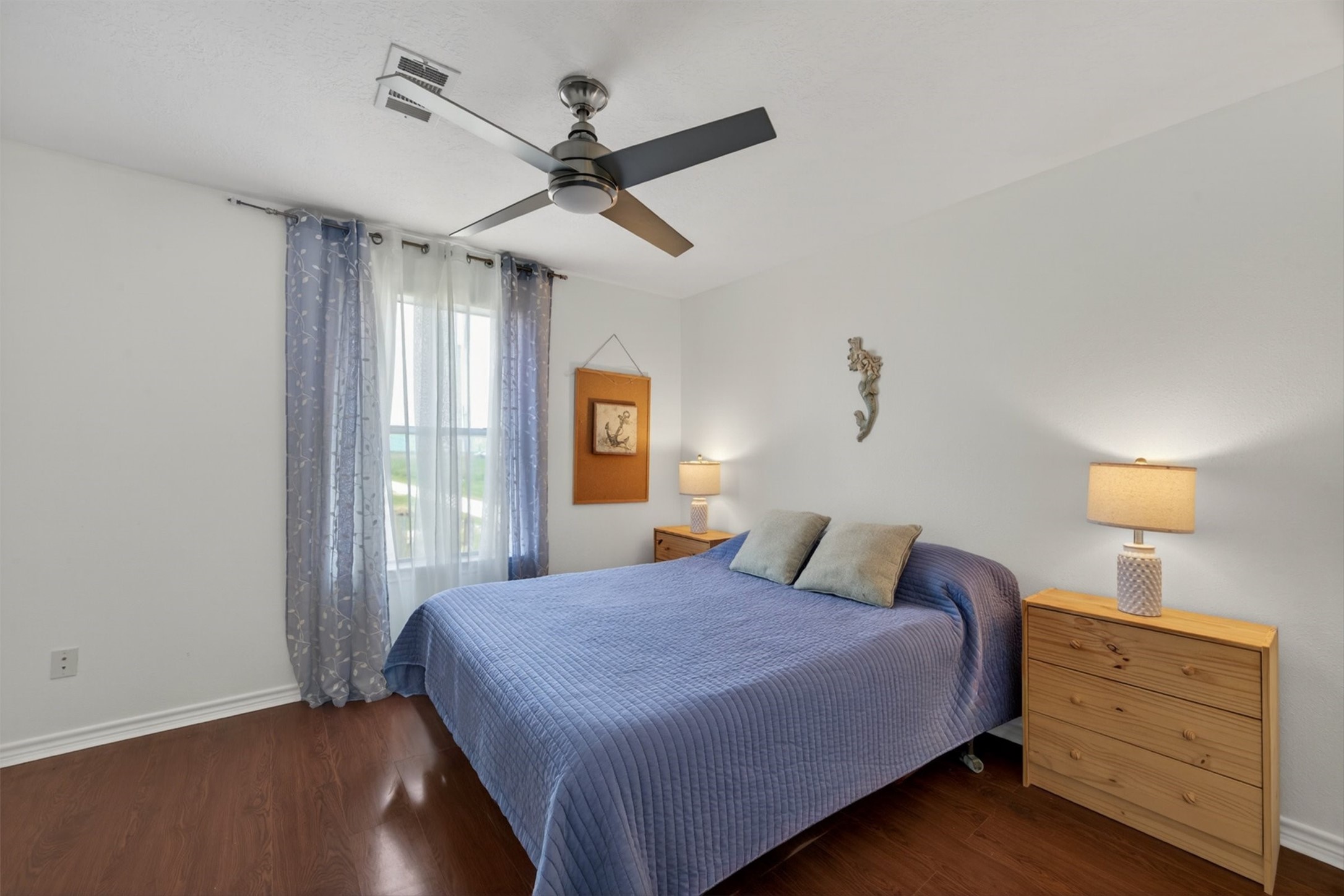 1209 North Jacks Road Crystal Beach, TX 77650 - Photo 22 of 39 Spacious and relaxing with soft natural light—another comfortable spot for guests or family.