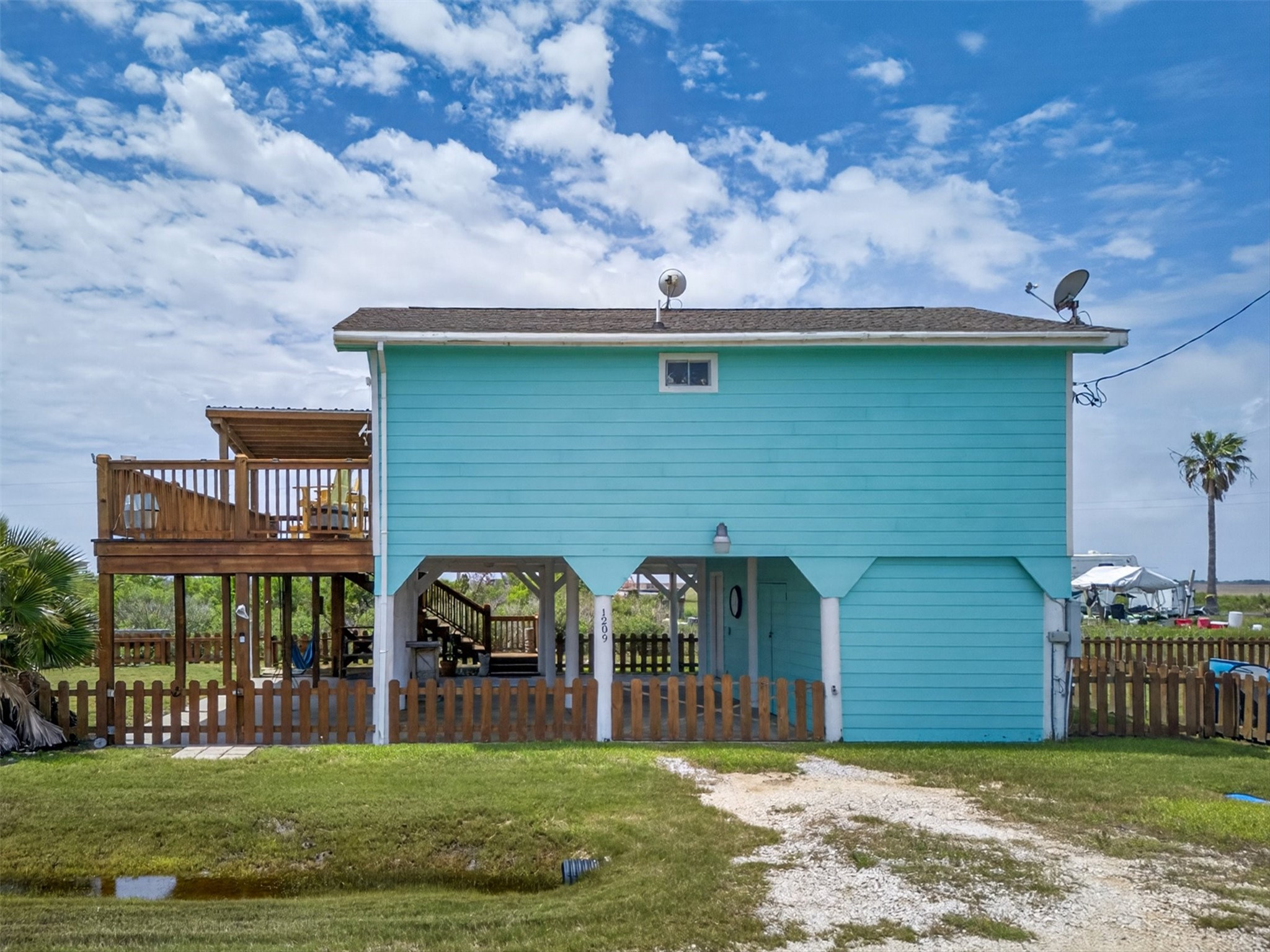 1209 North Jacks Road Crystal Beach, TX 77650 - Photo 25 of 39 Raised construction gives you peace of mind and functionality—plenty of covered space below for parking, entertaining, or storing all your beach and boating gear.