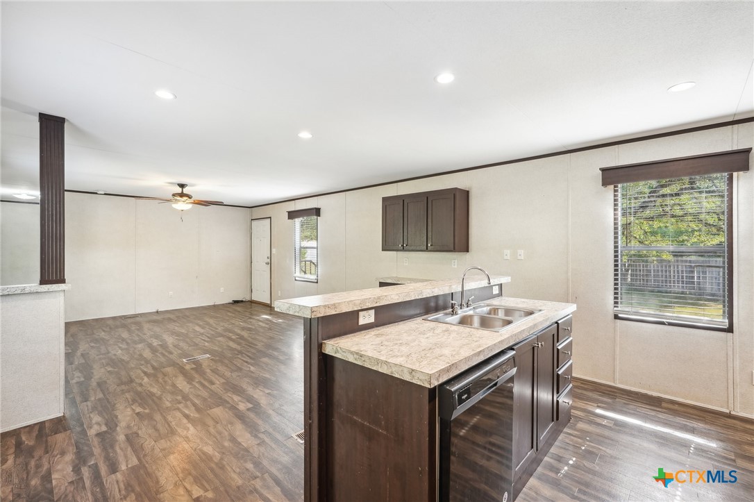 151 Deer River Drive Spring Branch, TX 78070 - Photo 11 of 29 a bathroom with a sink a vanity and a large mirror