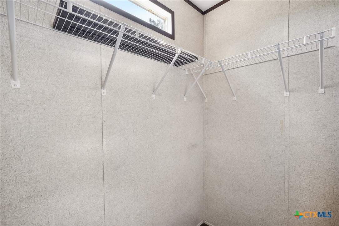 151 Deer River Drive Spring Branch, TX 78070 - Photo 21 of 29 a bathroom with a shower and a shower head