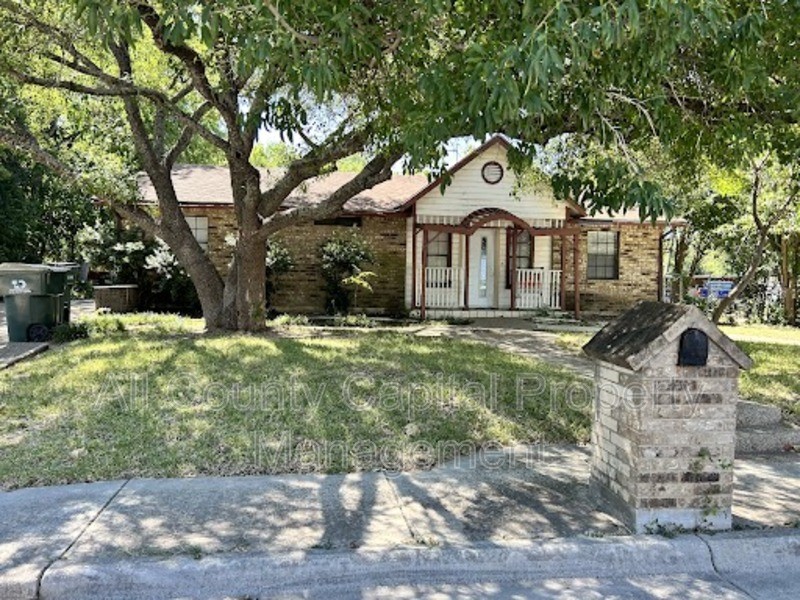 1128 Field Street San Marcos, TX 78666 - Photo 2 of 5 a front view of a house with garden