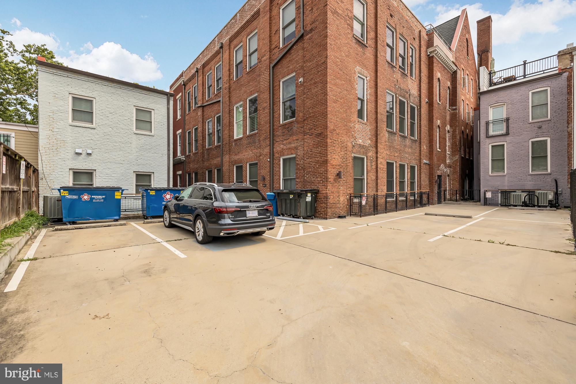 819 D Street Northeast, Unit 8 Washington, DC 20002 - Photo 25 of 26 a car parked in front of brick building
