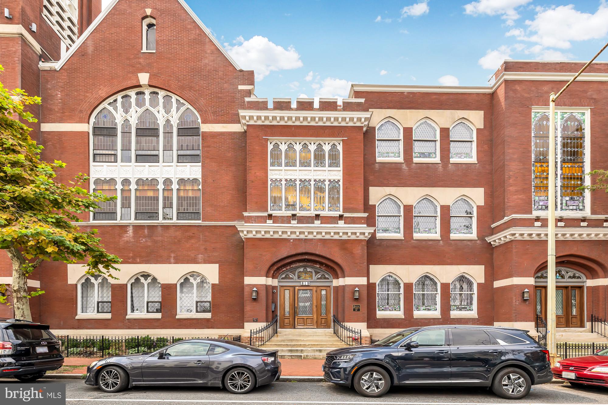 819 D Street Northeast, Unit 8 Washington, DC 20002 - Photo 3 of 26 an front view of a house with parking space